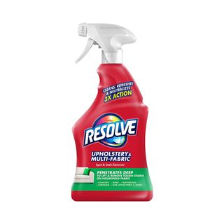 Resolve Upholstery & Multi-Fabric Spot & Stain Remover in red spray bottle
