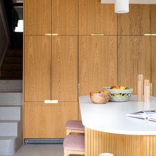 Oak kitchen with slab doors and banks of cupboards