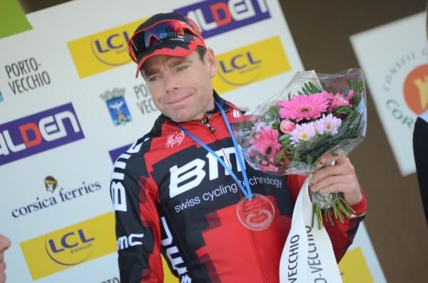 Cadel Evans (BMC) collects the flowers after winning stage 2 of Criterium International