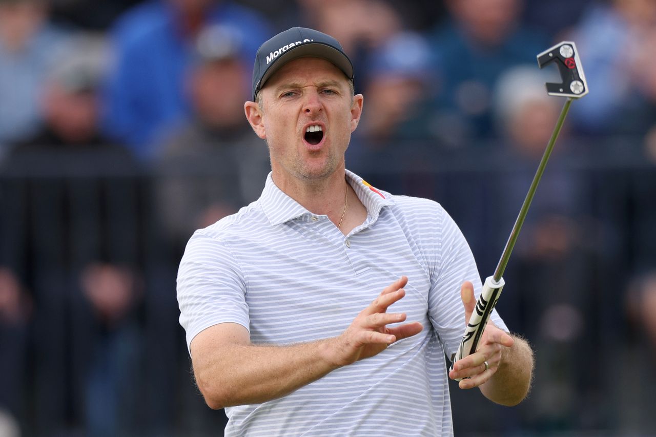 Justin Rose makes a shocked face as he misses a putt