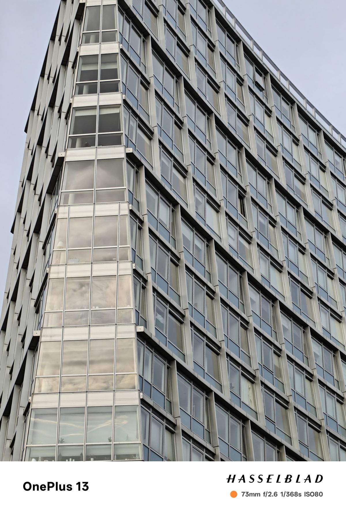 A tall building reflecting the sun