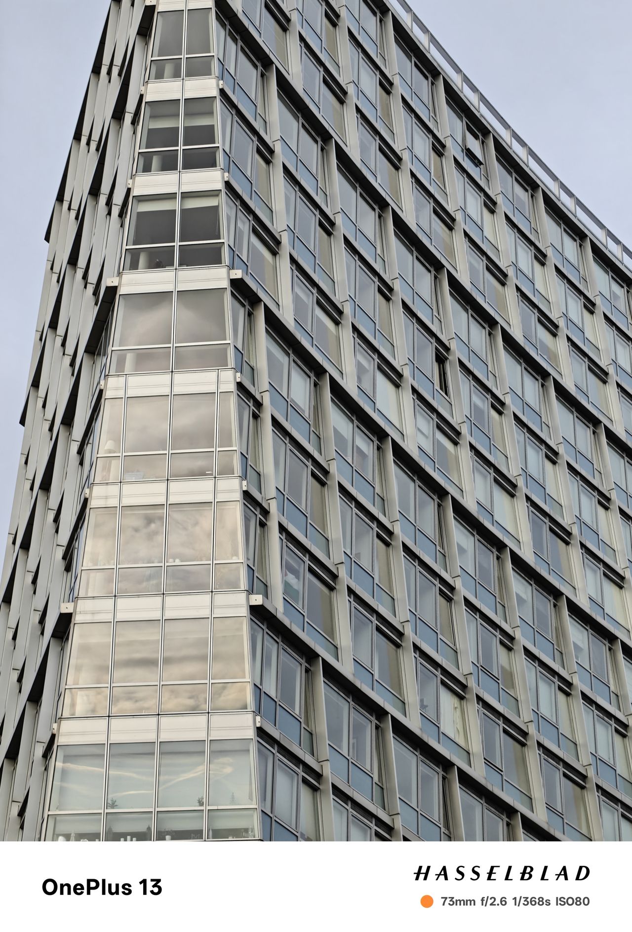 A tall building reflecting the sun