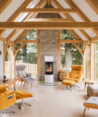 inside of oak extension living room with white log burner