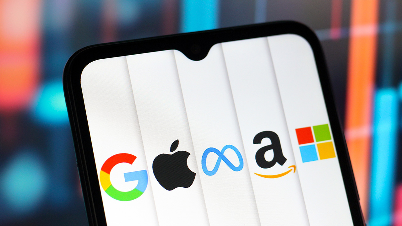 Smartphone screen displaying the logos of Google, Apple, Meta, Amazon, and Microsoft