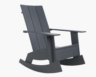 A slate grey Adirondack rocking chair made from recycled plastic