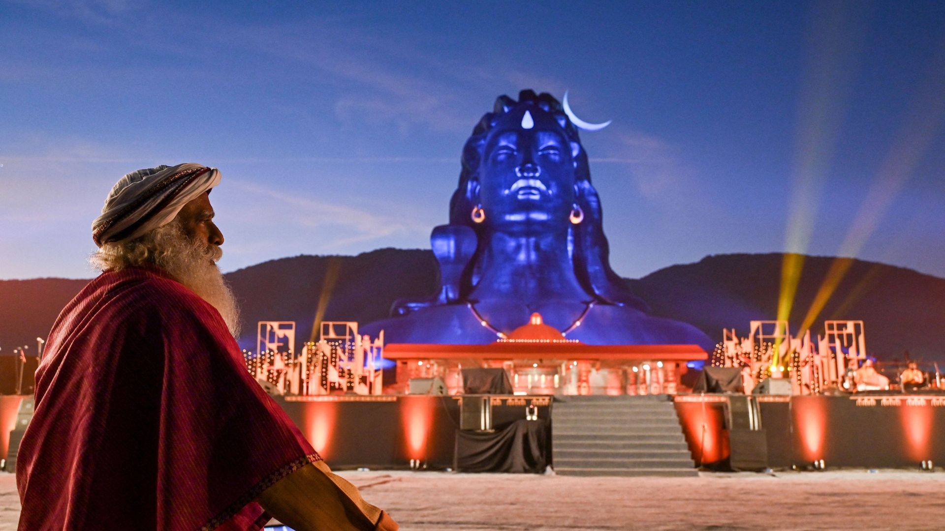 Sadhguru sitting at event in india