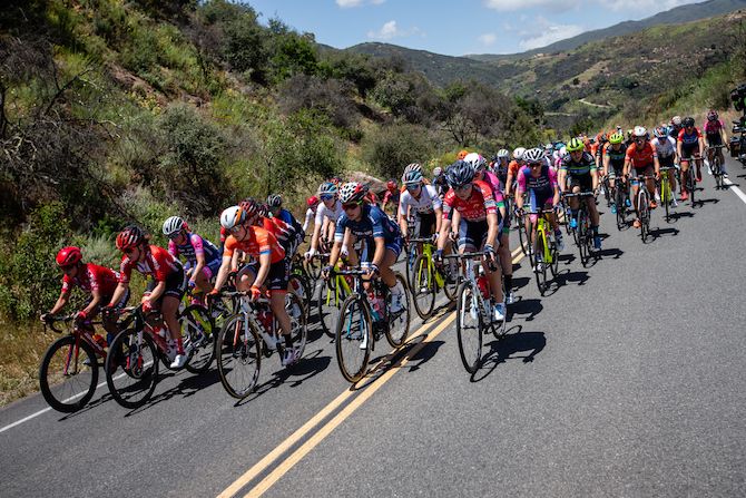 The peloton bunches up after descending from a climb on stage 1 of the 2019 Tour of California Women's Race