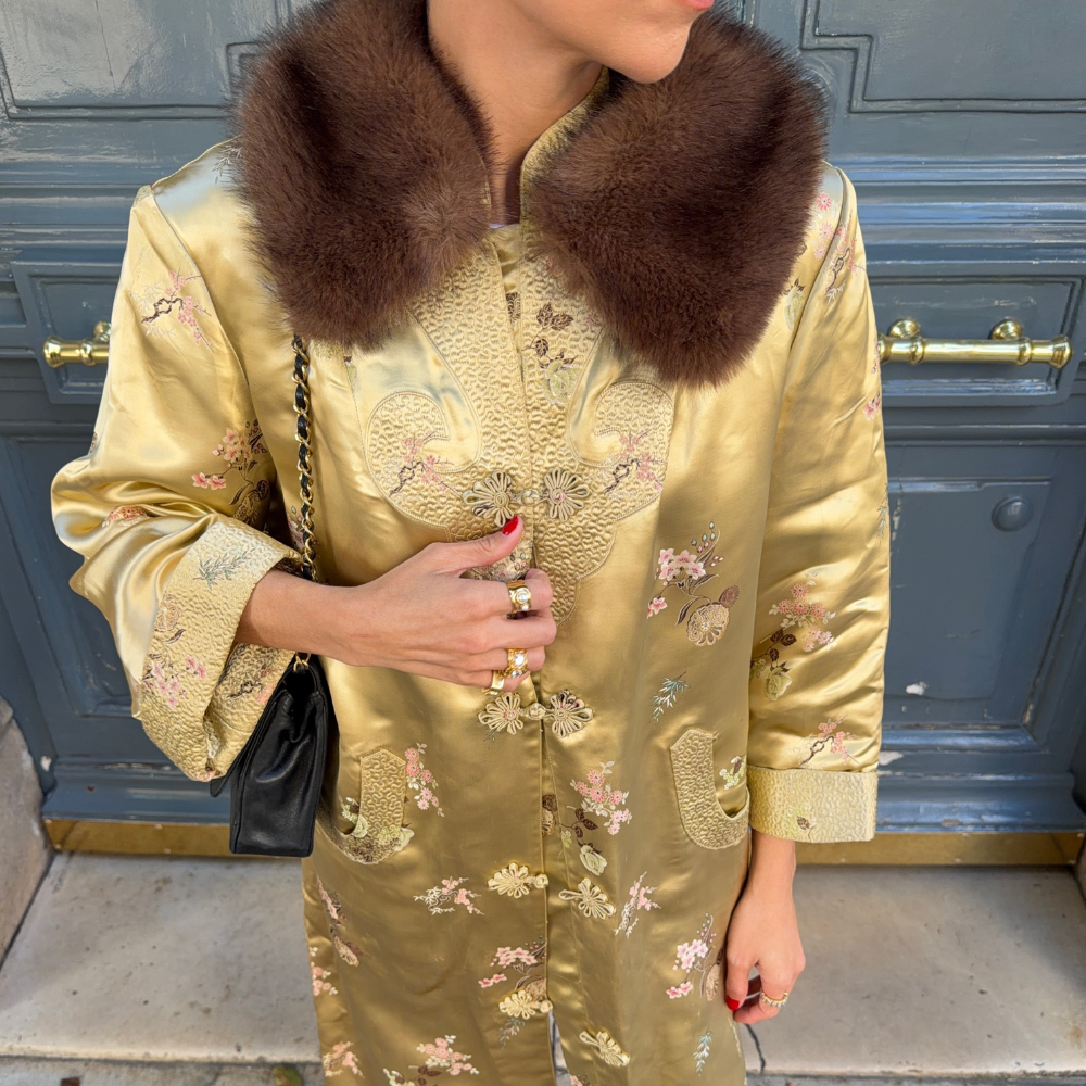 An image of @noellecrooks wearing an opera coat, one of the biggest It girl trends for winter 2026.
