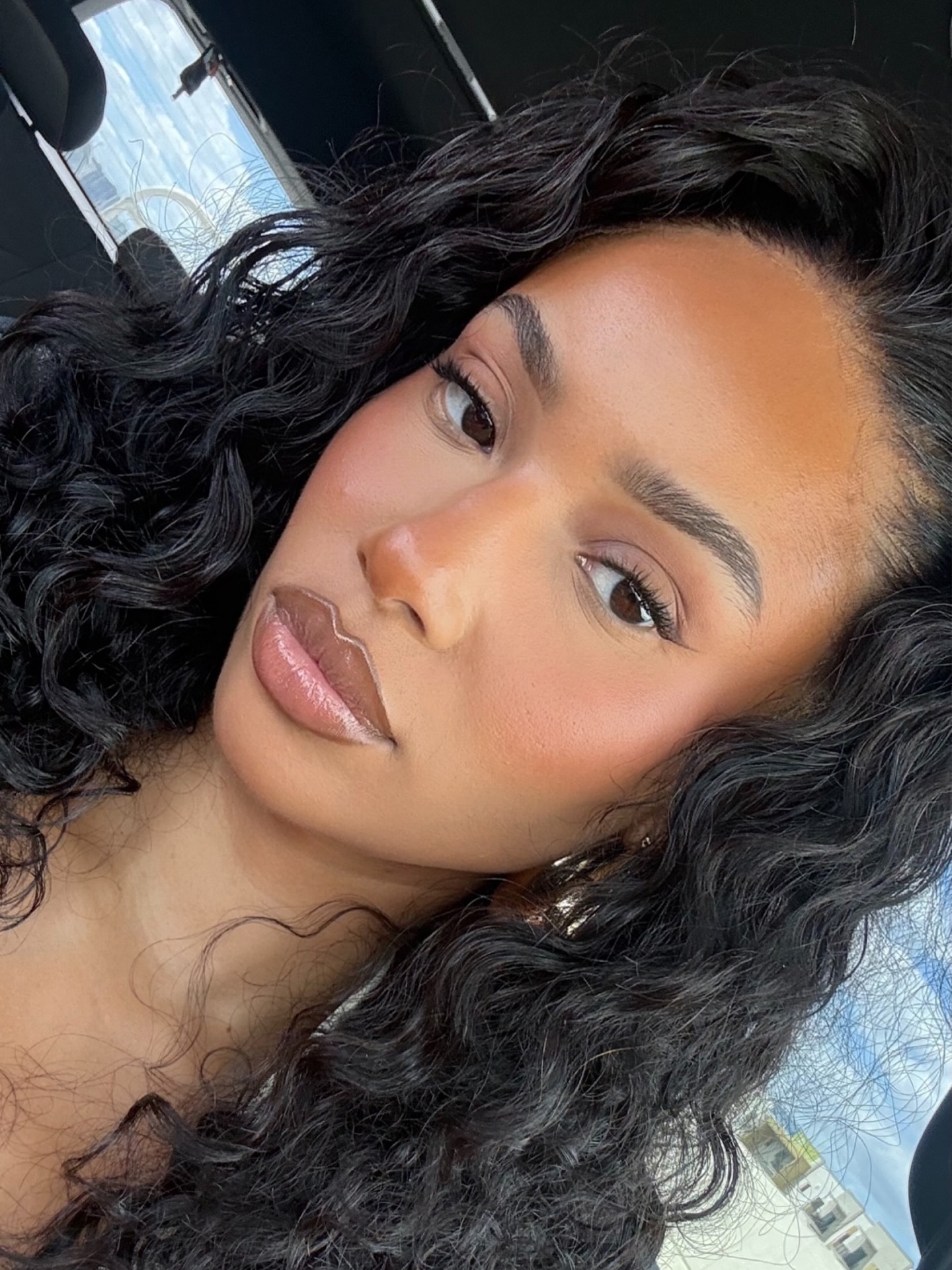 Photo of a woman wearing brown monochrome makeup