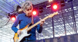 Eric Johnson plays his Strat onstage at a hometown show in Austin, TX.