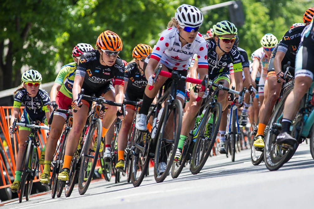 Optum riders start to bring the green jersey to the front for the finish