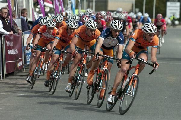 The team from Genesys Wealth Advisers on the front of the peloton trying to chase down four riders up ahead.