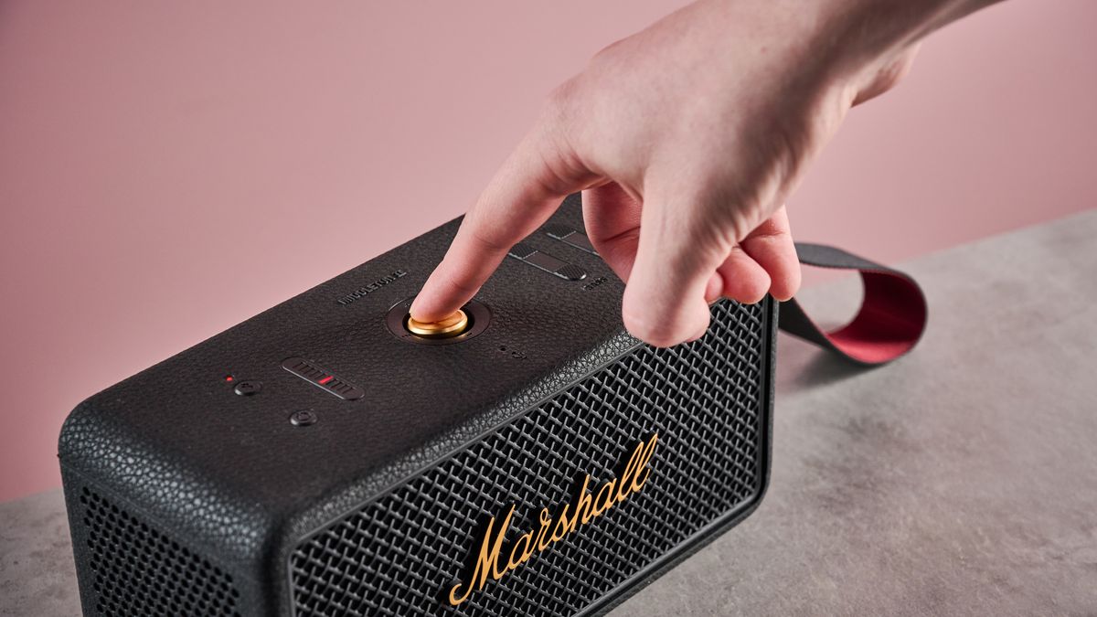 Man pressing button on the Marshall Middleton II