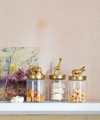 Fun glass storage jars with gold animal lids