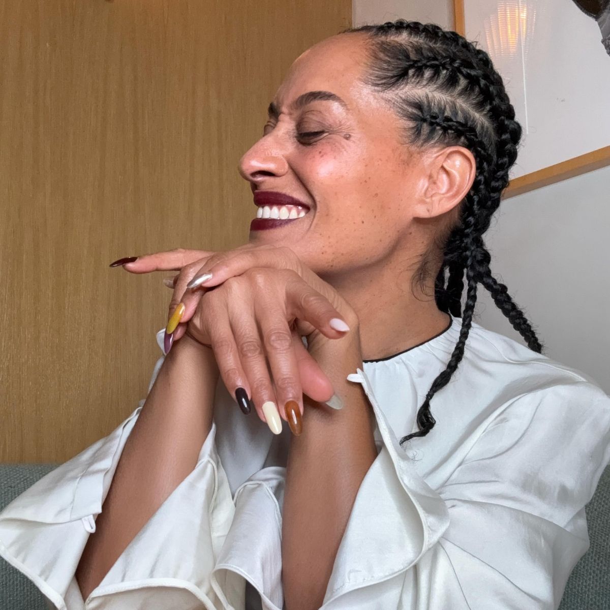An image of @traceeellisross wearing one of the best tinted moisturisers for mature skin.