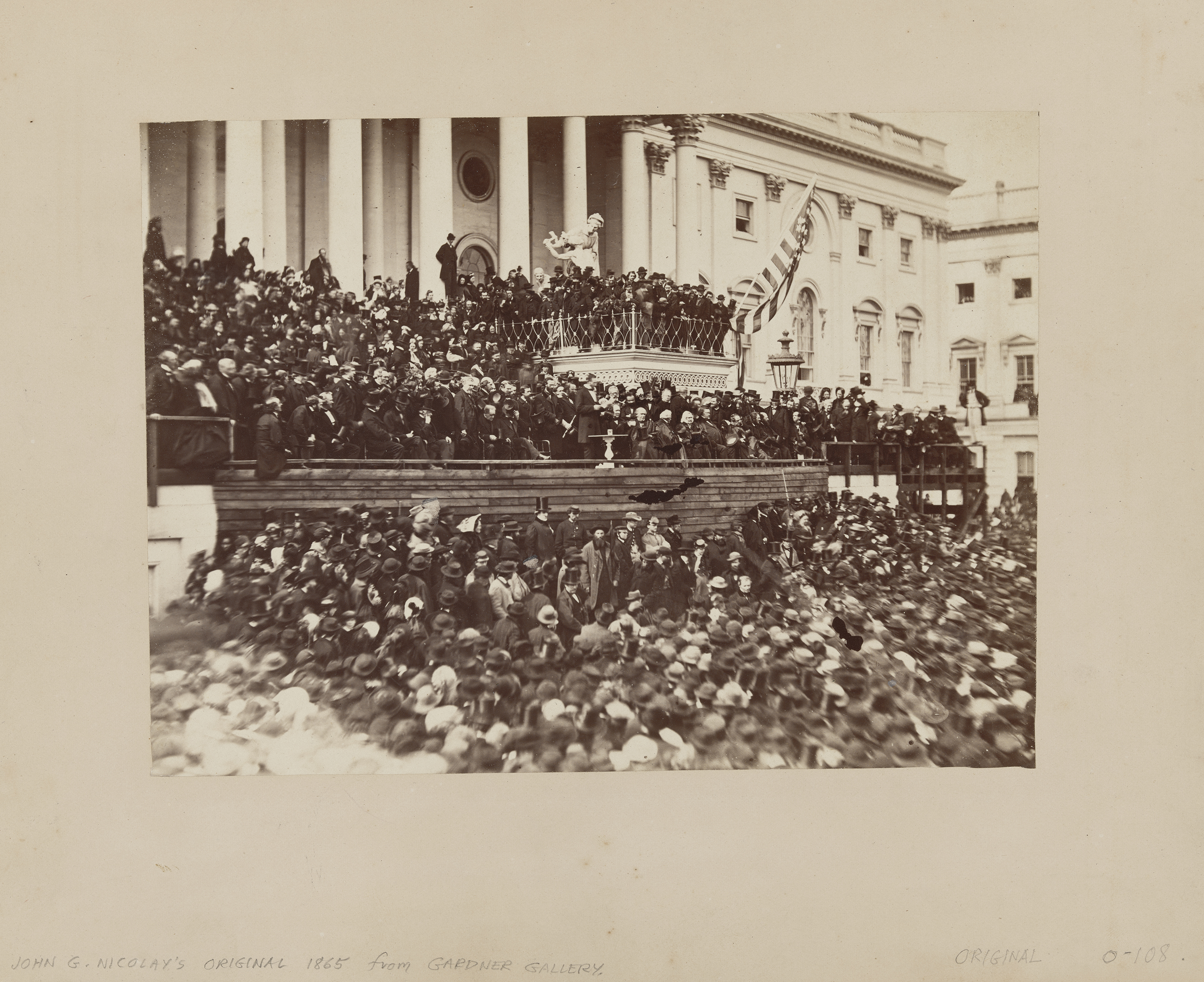 A massive crowd of people gathers in front of the U.S. Capitol building for Abraham Lincoln's second inaugural address in 1865.