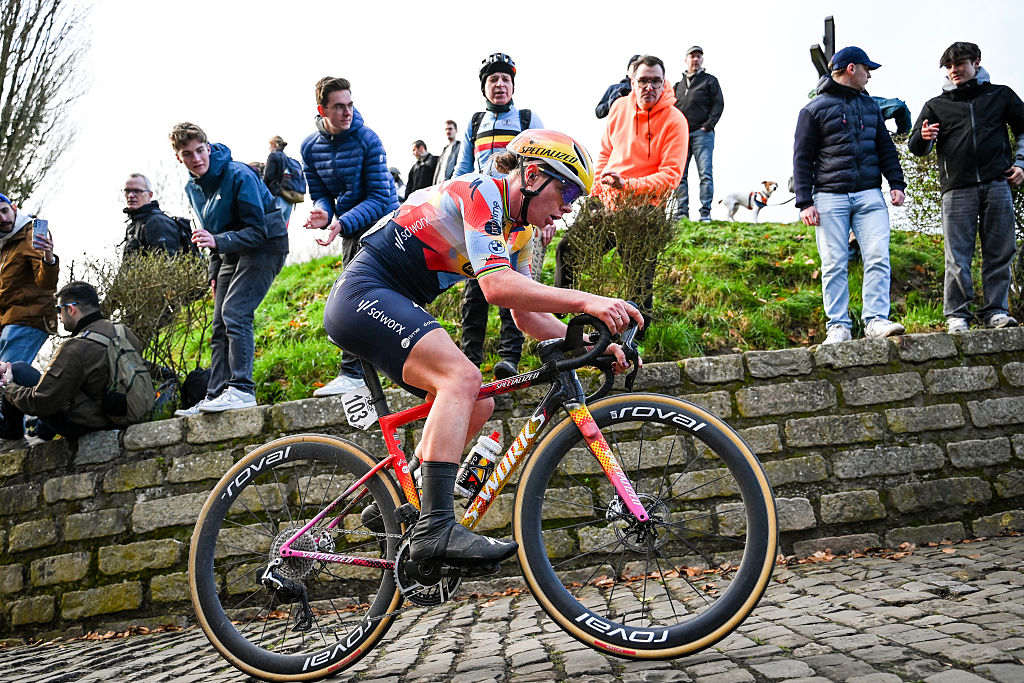 Belgium's Lotte Kopecky of SD Worx-Protime rides on the Kapelmuur in Geraardsbergen during the women's one-day cycling race Omloop Het Nieuwsblad (UCI World Tour), the opening race of the Flemish one-day classics season, 137,6 km from Gent to Ninove, on February 28, 2026. (Photo by ELIAS ROM / Belga / AFP) / Belgium OUT