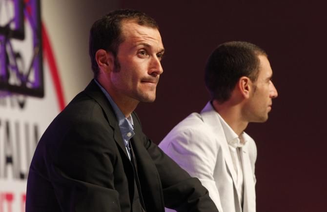 Ivan Basso and Vincenzo Nibali watch on