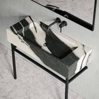 This pietra vernante vanity unit with a panda marble basin is bound to create interest in any space