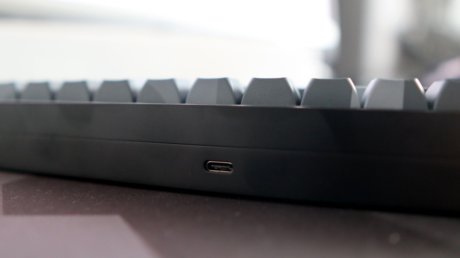 A Das Keyboard DeltaForce 65 gaming keyboard with Cherry MX switches and in camo colourway on a desk.