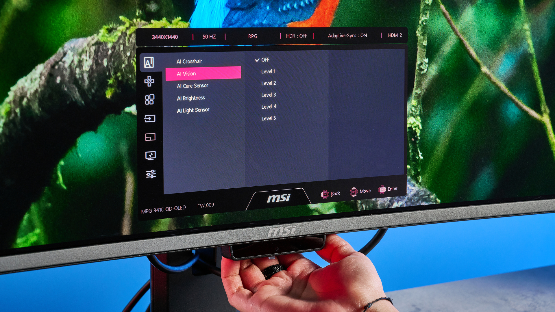 An MSI MPG 341CQR QD-OLED X36 gaming monitor in black