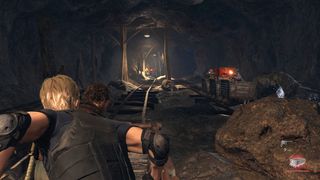 Resident Evil 4 review; a character rides a mine craft