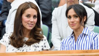 Catherine, Duchess of Cambridge and Meghan, Duchess of Sussex attends day twelve of the Wimbledon Tennis Championships