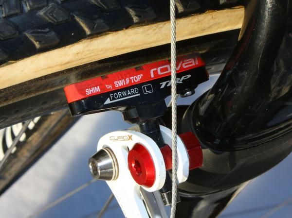 Color coordination isn't the motivation behind Wells' choice of brake pads. He says the Specialized Roval carbon-specific compound (made by SwissStop) provides better initial bite than most carbon pads.