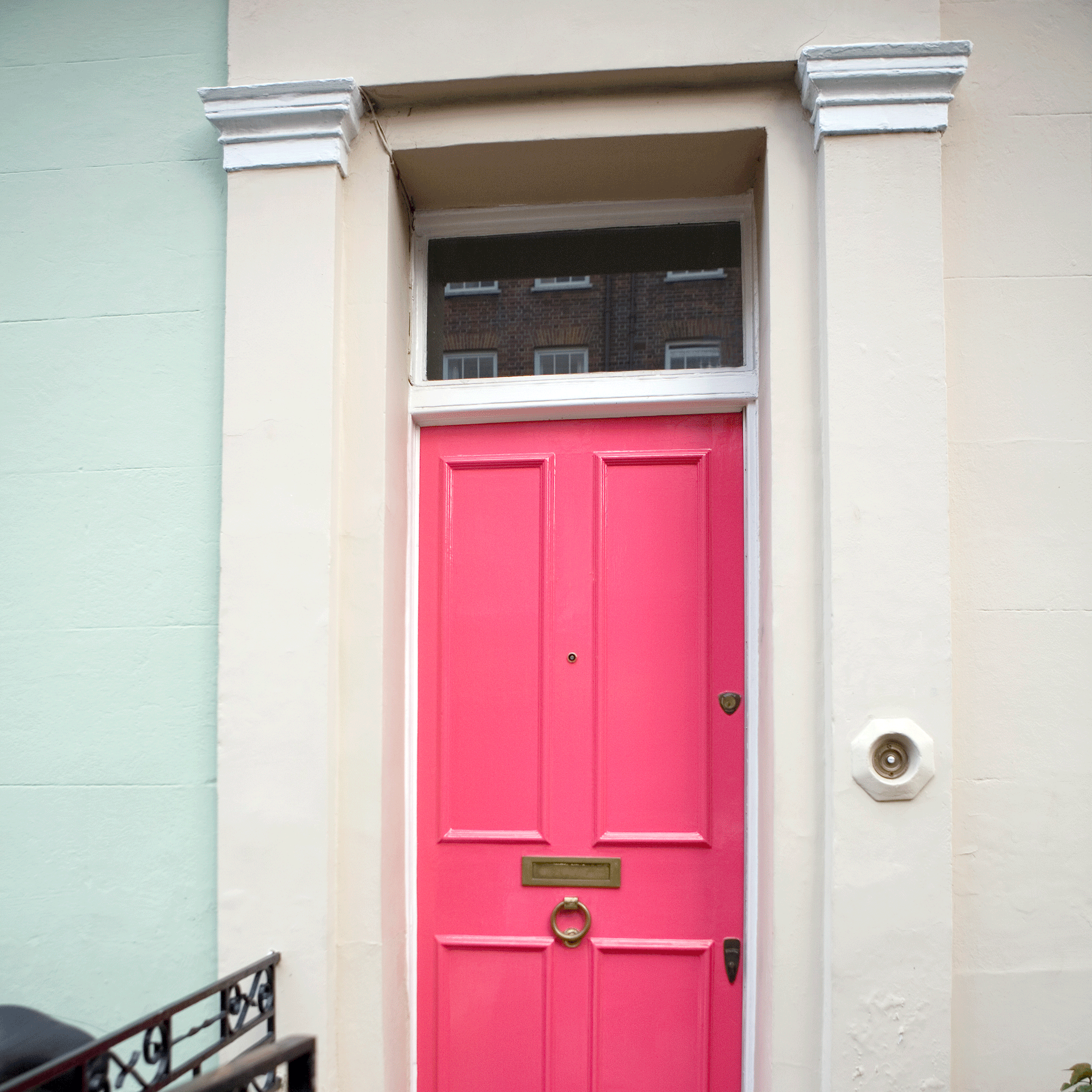 Pink door with doorbell