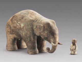 This gilded bronze sculpture, found in Liu Fei's tomb, shows an elephant and its mahout, the person who works with, tends and rides the elephant. During the second century B.C., China had contact with groups in Southeast Asia where elephants could be foun