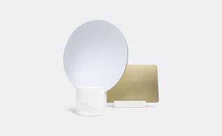mirrors with decadent gold leaf backs and marble bases