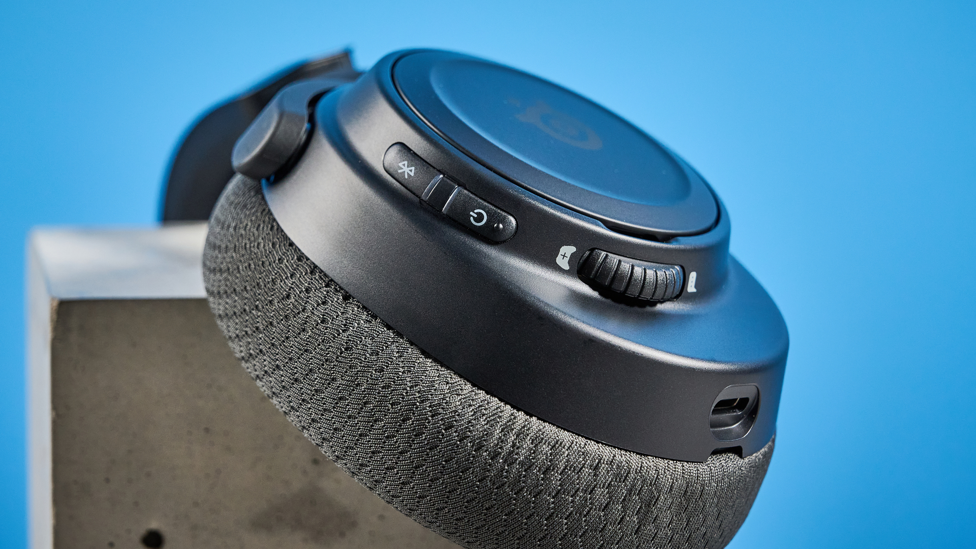 The SteelSeries Arctis Nova 7 Gen 2 against a blue background