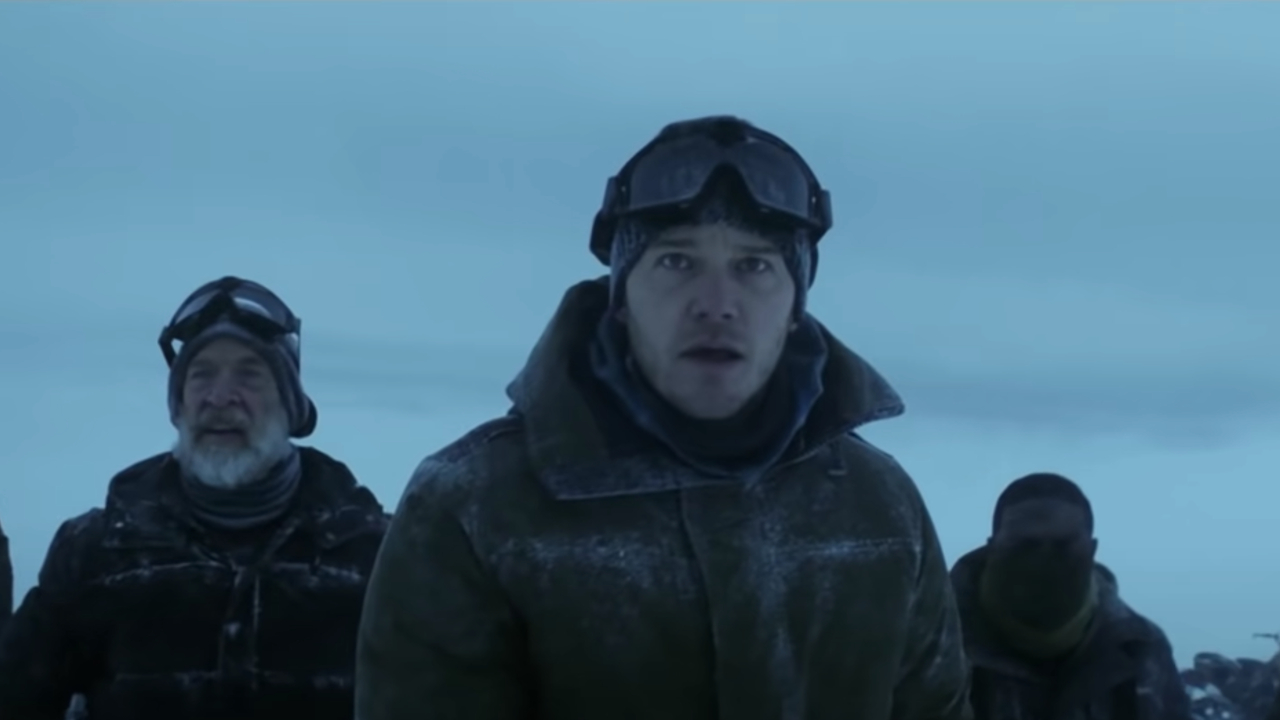 J.K. Simmons, Chris Pratt, and Sam Richardson stand ready in the snowy open in The Tomorrow War.