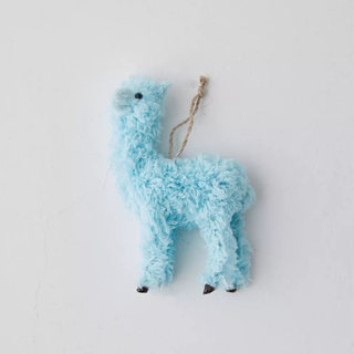 A fluffy blue llama Christmas ornament