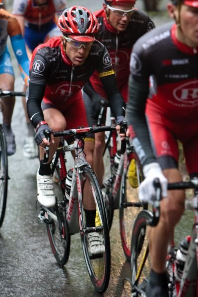 Levi Leipheimer rides protected behind his Team Radioshack team-mates.