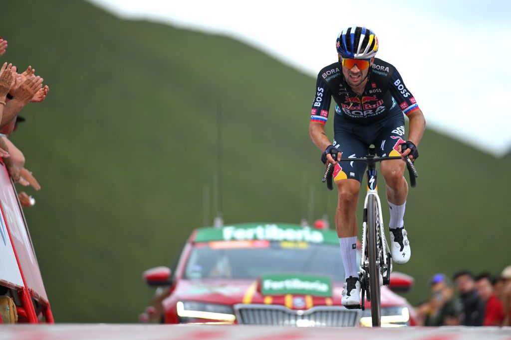 Vuelta a Espana 2024: Primoz Roglic of Slovenia and Team Red Bull Bora hansgrohe crosses the finish line during the La Vuelta 79th Tour of Spain 2024 Stage 13 a 176km stage from Lugo to Puerto de Ancares 1659m UCIWT on August 30 2024 in Puerto de Ancares Spain Photo by Tim de WaeleGetty Images