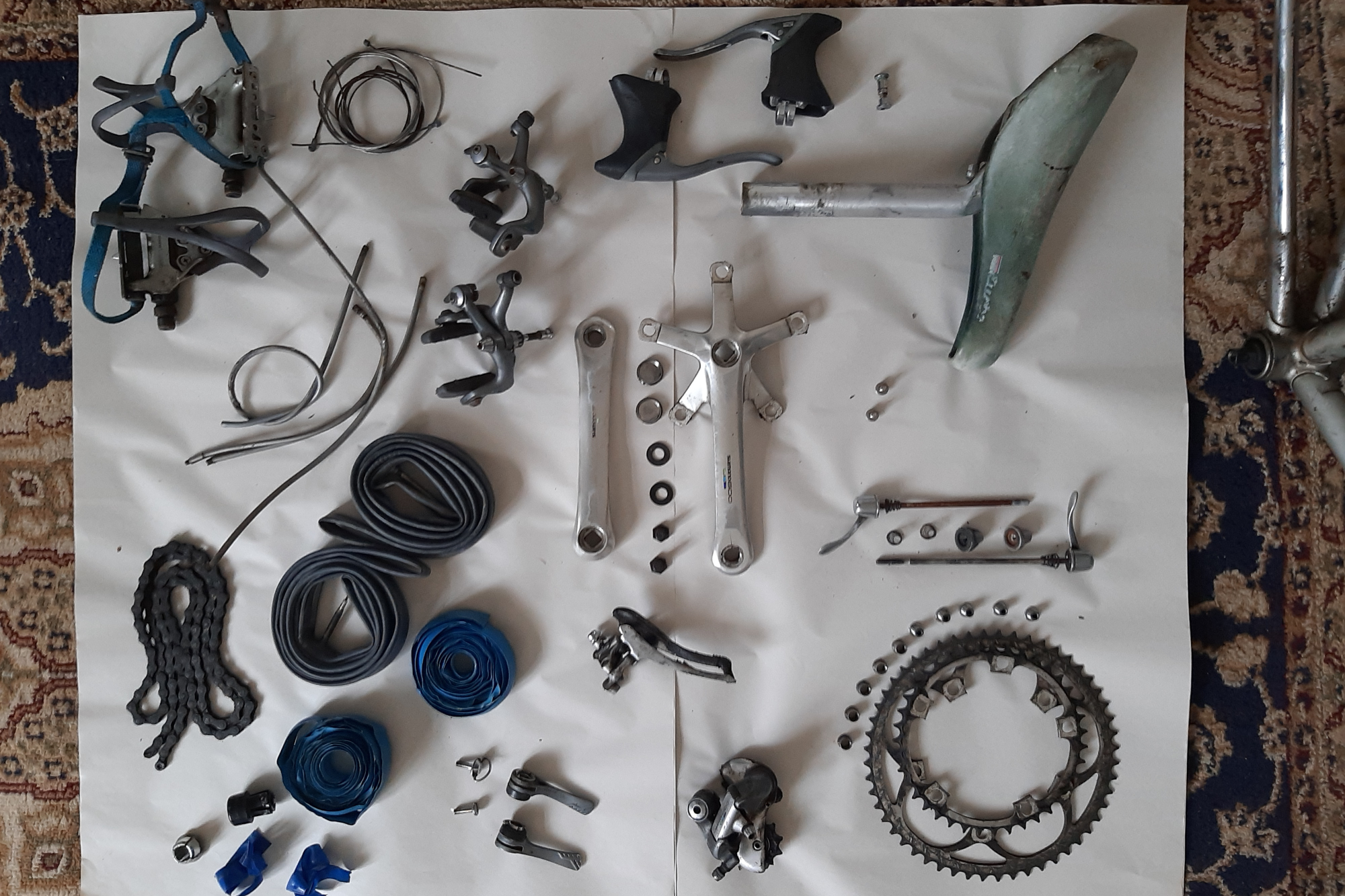 Parts stripped from a Ribble steel road bike reading for restoration