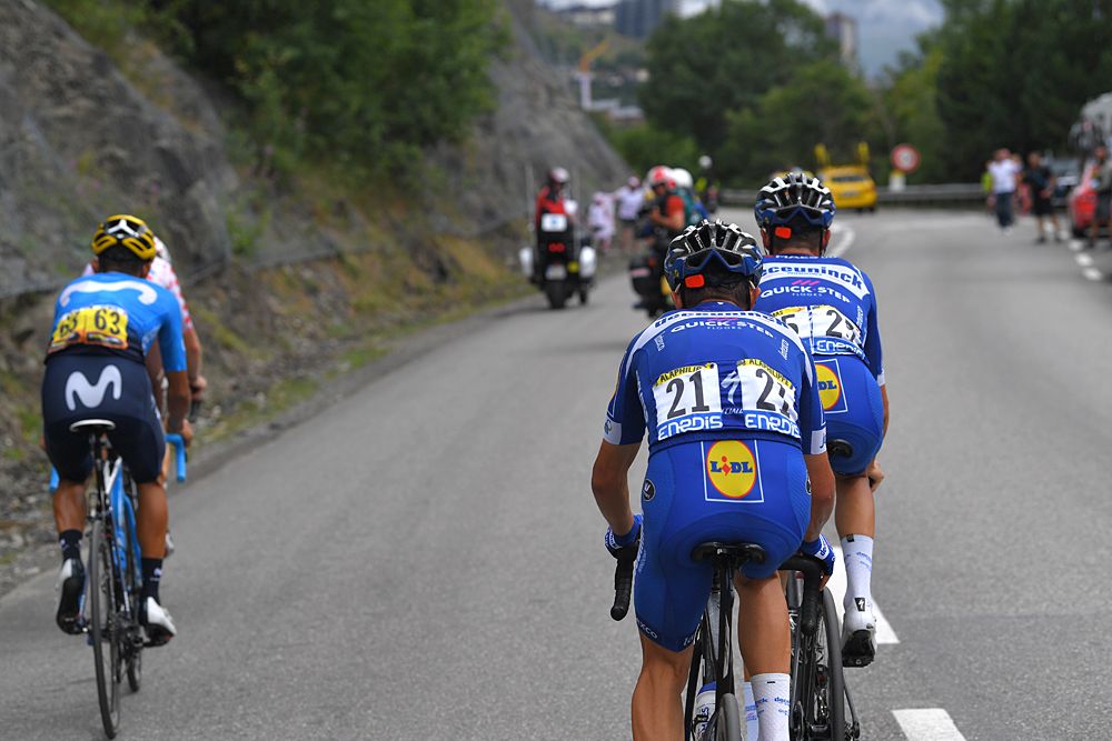 Enric Mas helping Julian Alaphilippe (Deceuninck-QuickStep) during stage 20 at the Tour de France