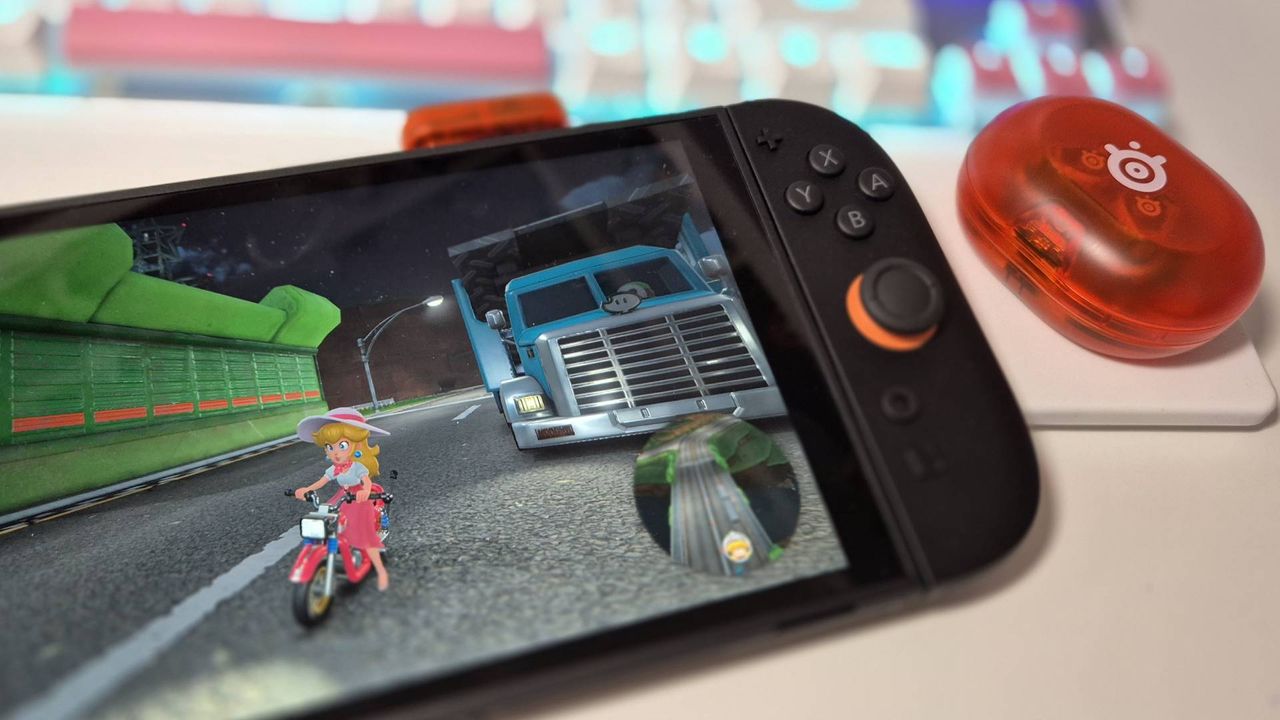Photo of the Nintendo Switch 2 hooked up to the SteelSeries Arctis Game Buds.