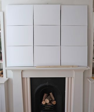 blank canvasses arranged over mantle