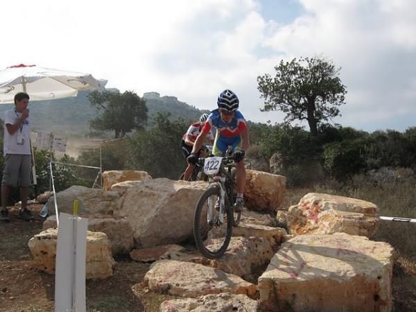Tanja Zakelj (Slovenia) races toward third.