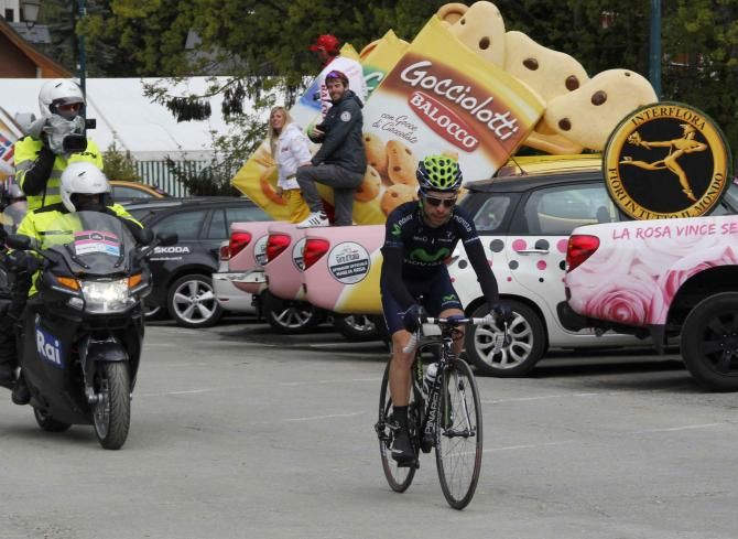 Galibier stage winner Giovanni Visconti (Movistar) is followed by a race TV moto