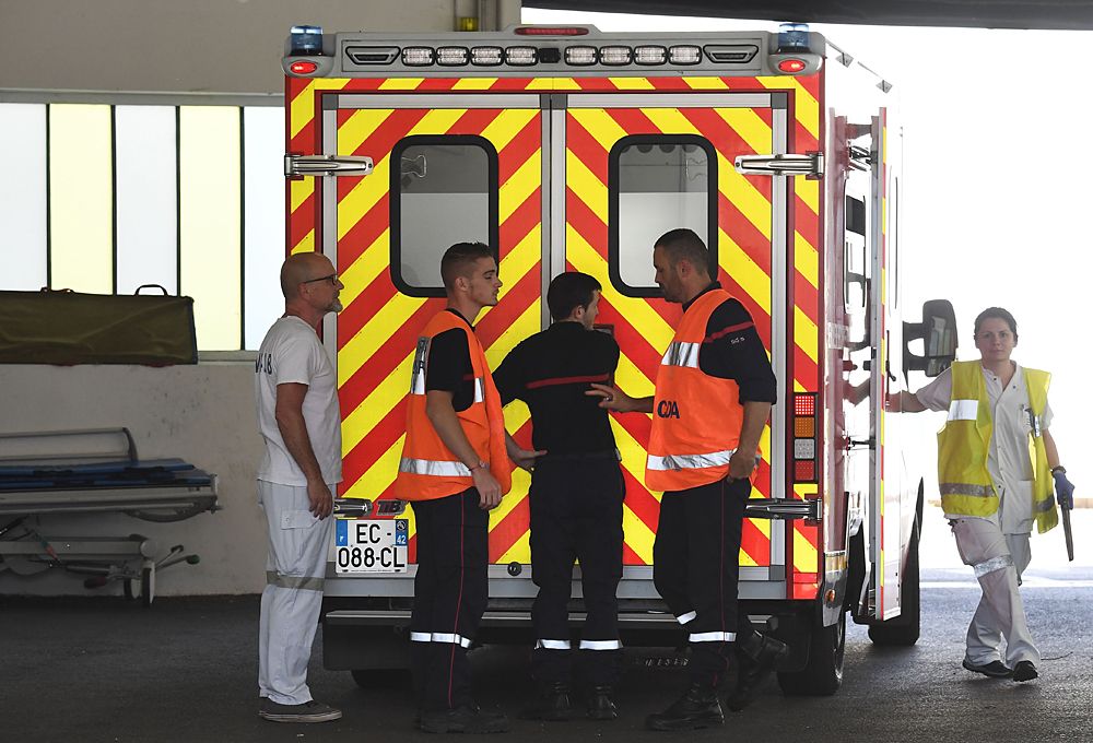 An ambulance car transporting Team Ineos rider Great Britain's Christopher Froome, after he fell on a training run ahead of the fourth stage of the 71st edition of the Criterium du Dauphine cycling race, arrives at the Centre Hospitalier in Roanne on June 12, 2019