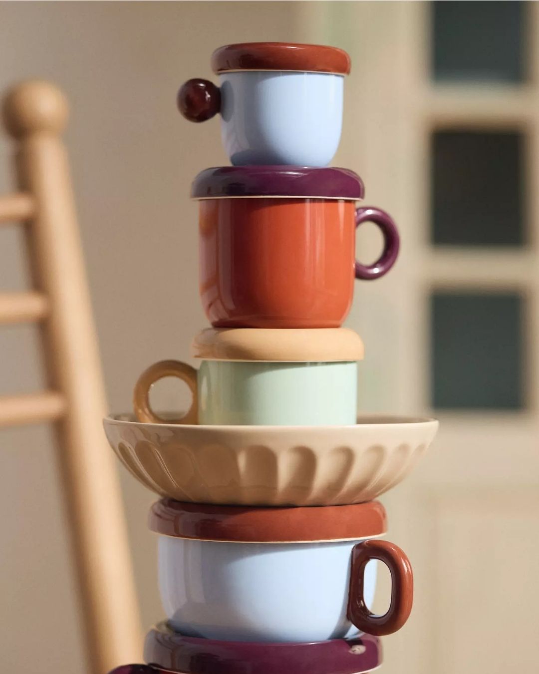 Rika Stoneware Espresso Cups, styled on top of each other against a blurry background.