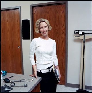a blonde woman in a medical office