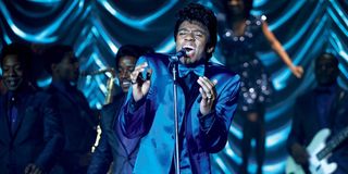 Chadwick Boseman as James Brown performing in a blue tux in Get On Up