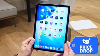 iPad Air M4 held in hand