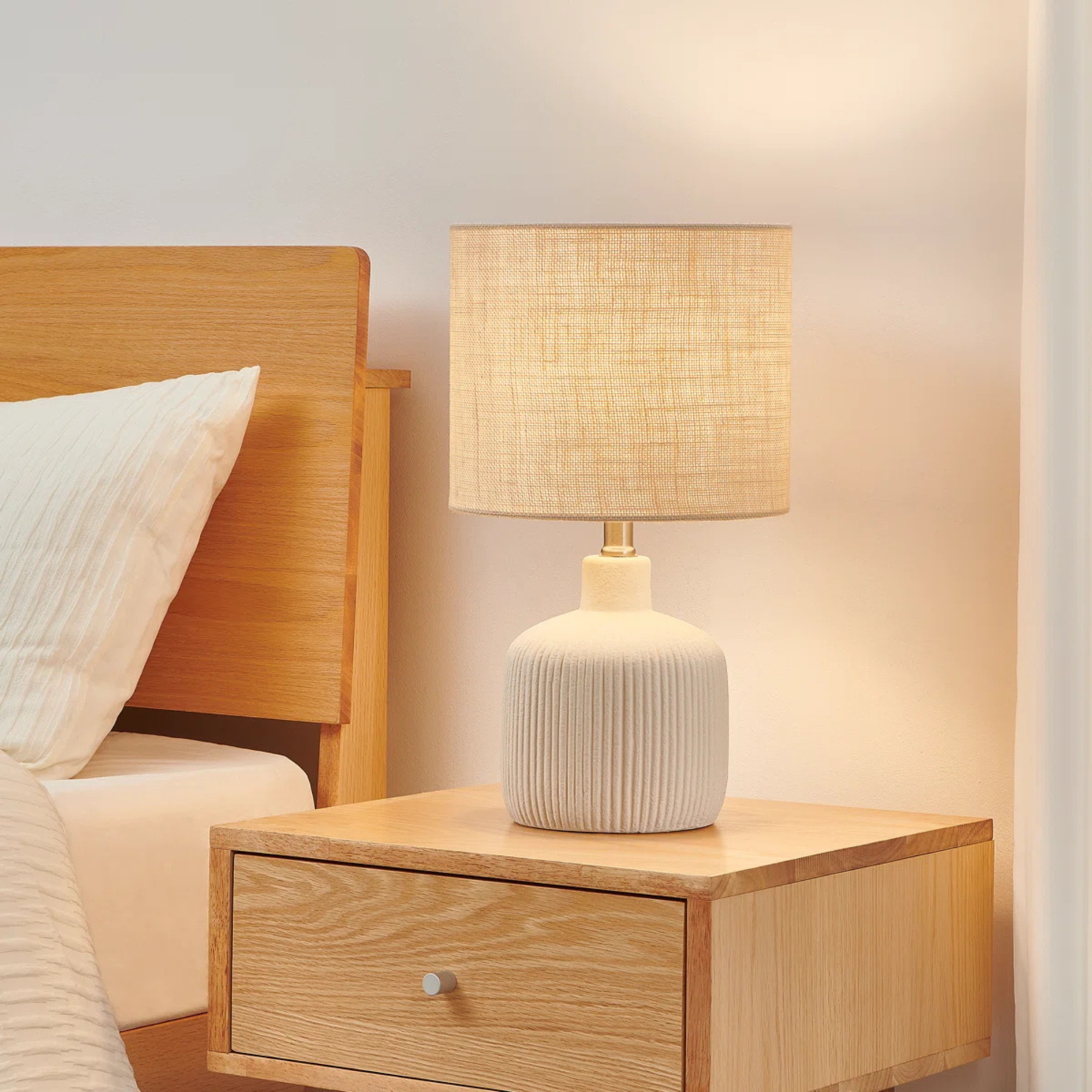 A beige textured table lamp