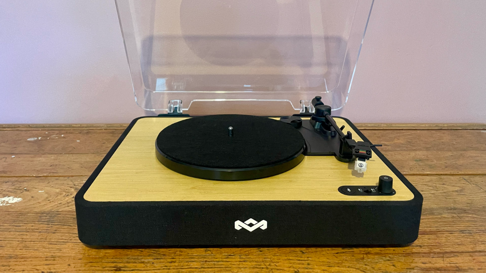 House of Marley Revolution Bluetooth turntable on a wooden table