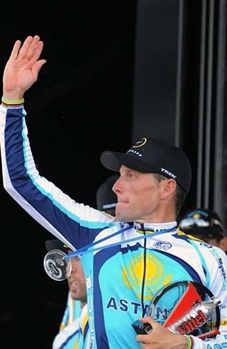 Lance Armstrong of Team Astana came within a fraction of a second of taking the yellow jersey.